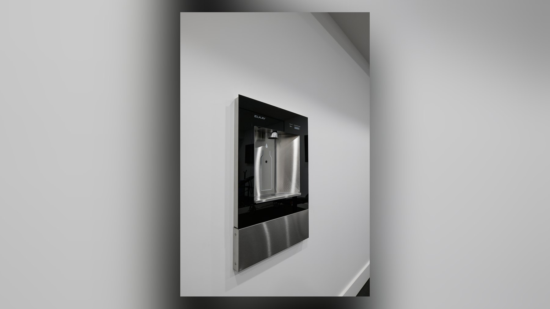 Recessed Elkay bottle filler built into the wall