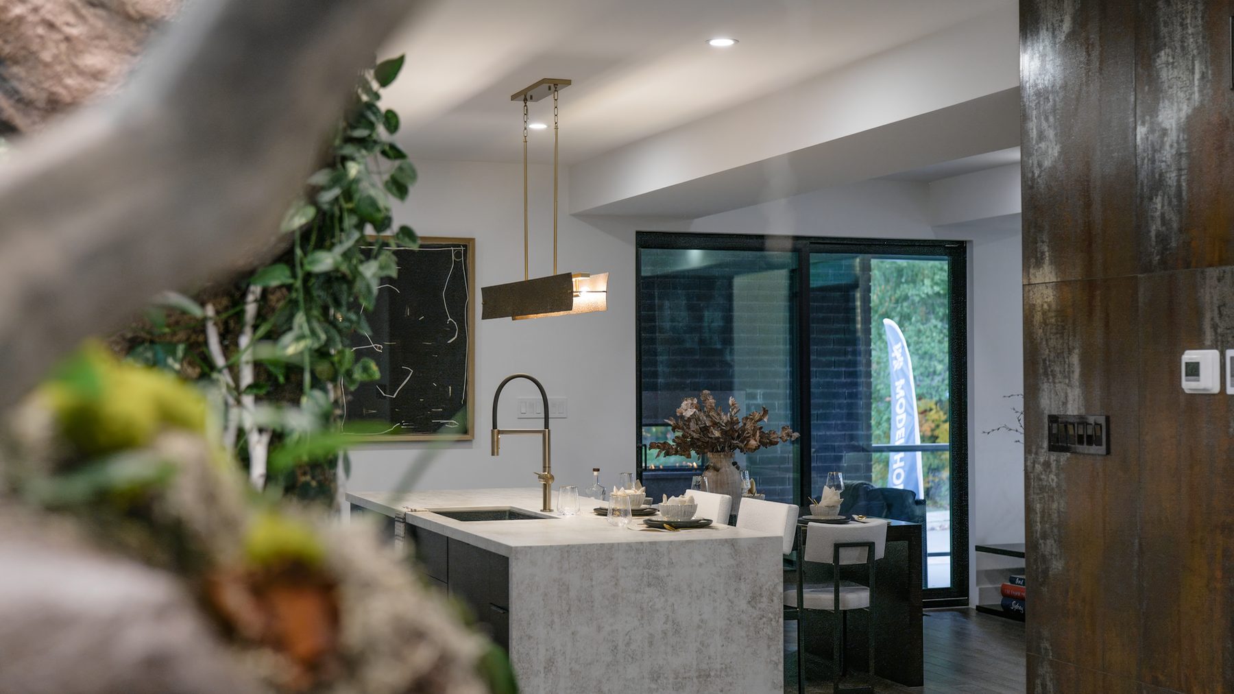 Custom kitchen and dining opening to the backyard